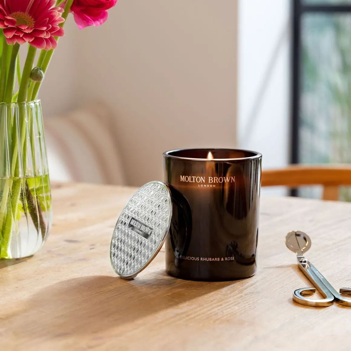 Molton Brown Delicious Rhubarb & Rose Signature Scented Single Wick Candle.